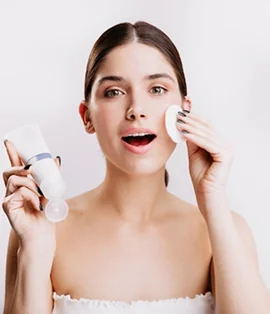 close-up-shot-green-eyed-girl-doing-spa-procedure-white-wall-woman-moistens-her-face-with-dove-cream_197531-13869-1.png